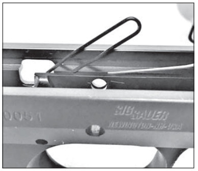 Archive image from page 5 of SIG P210A Working the US-made SIG P210A models.